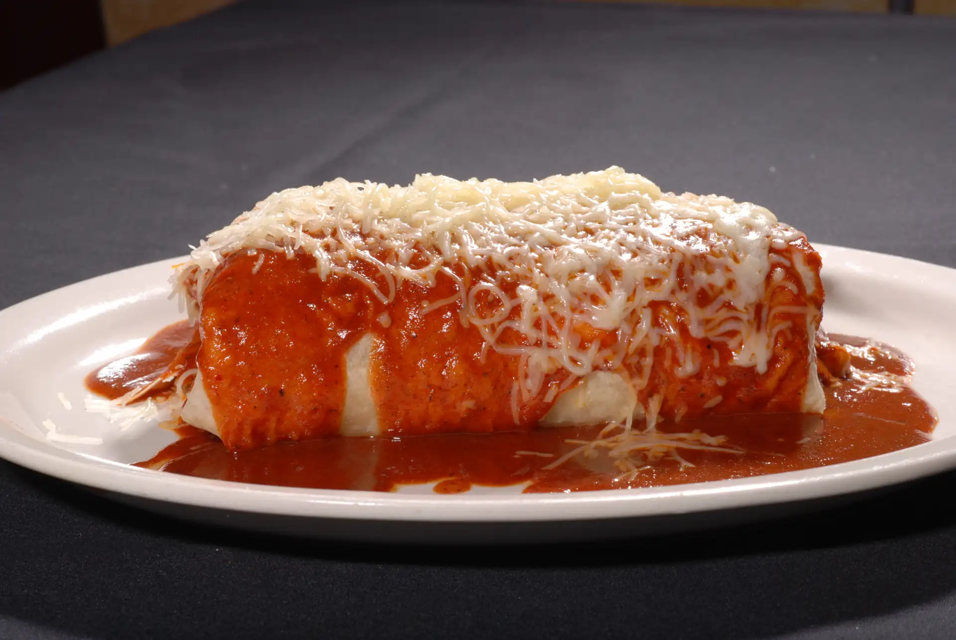 Wet Burrito with red sauce and cheese